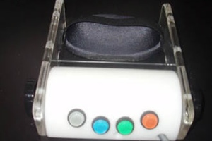 Device with gray, blue, green and orange buttons