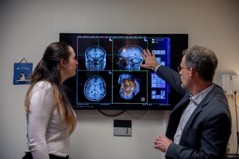 Researchers talking about brain scans